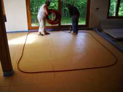 On July the 7th the plumber (Michel) came back to put down the tubing for the underfloor heating.