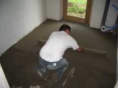 The screed being laid in the sous sol shower room and laundry.