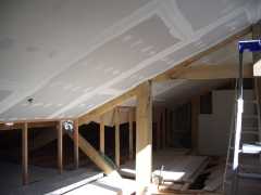 The finished plasterboard ceiling ready for painting.